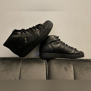 Used, like new,  SIZE 9.5 Adidas High Tops black and gold